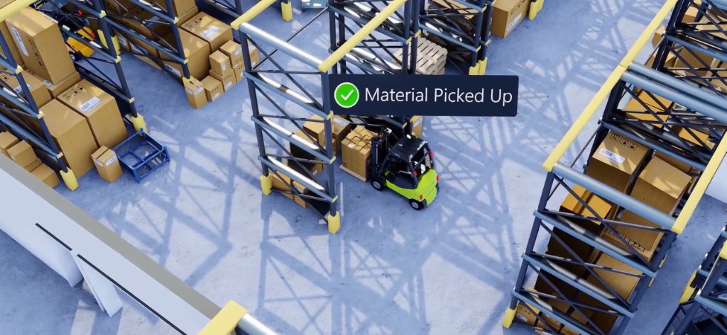 3D warehouse twin showing Material Picked Up on a forklift with pallet