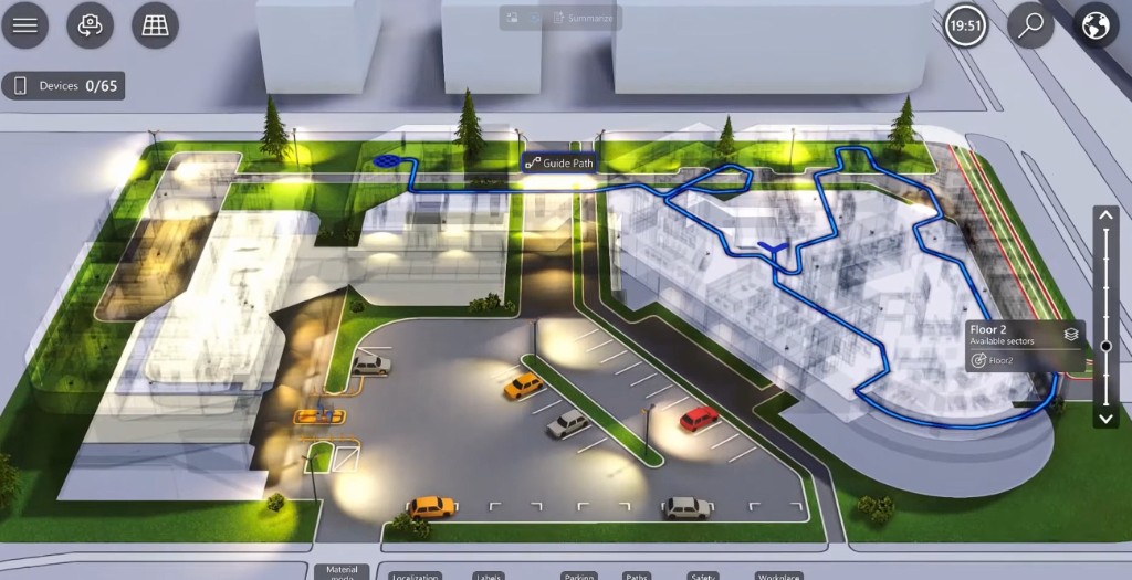 Guide path from courtyard into a multi-floor office twin in twinzo